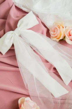 Andi Piper Bow