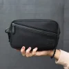 Andi Sling Wallet in Black Neoprene