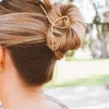 Andi Twisted Gold Claw Clip